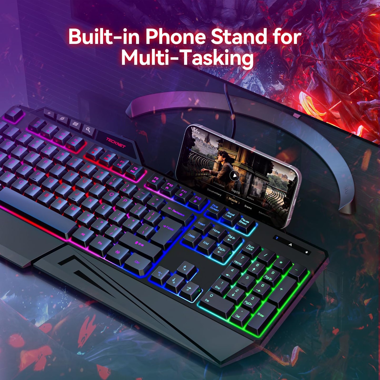 TECKNET Kabelgebundene RGB-Gaming-Tastatur – 26-Tasten-Anti-Ghosting, 13 Beleuchtungsmodi, spritzwassergeschützt, 108 Membrantasten, Plug &amp; Play – mit ergonomischer Handballenauflage und Telefonhalterung für Windows/Mac (Schwarz)