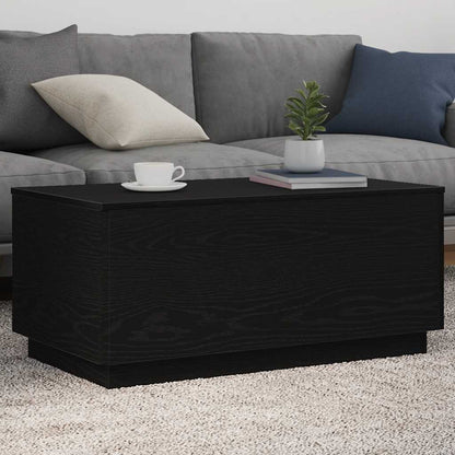 Couchtisch mit LED-Leuchten Schwarz Eichen-Optik 90x50x40 cm